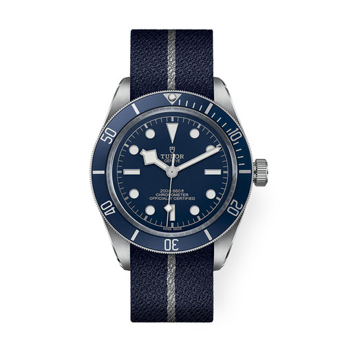 39mm Tudor Black Bay 58 featuring a blue dial & bezel with a stainless steel case. Comes with a blue fabric strap.
