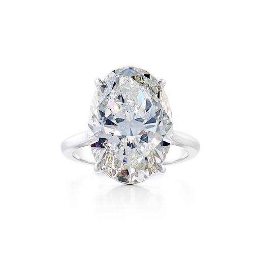 A solitaire style engagement ring with a platinum band and a 10.06 carat oval cut center stone that is an I color and VS1 clarity according to GIA.